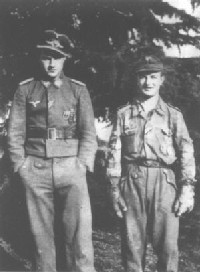<p class='eng'>The two Fallschirmjager belong to Kompanie 4,Fallschirmjager Regt.4, 1st Fallschirmjager Division. Left Raimund Eckel, Right Karl Newedel. Eckel was the leader of the 14th Company, Fallschirmjager Regt.4 and Karl Newedel was a platoon leader (Rainbow Group). Info by Peter Scott.<br /><br />A copy of this photograph was donated by Karl Nevedel to Lottici Mauro and Marco Marzilli.</p>