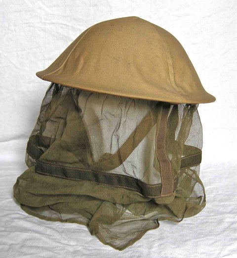 <p>Elmetto inglese MK I con zanzariera e copertina mimetica.</p><p class='eng'>MK I Britih helmet with mosquito net and camo cover.</p>